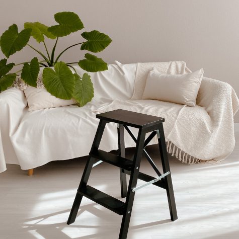 White sofa with dark ladder studio furniture